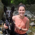 author and her dog by the water