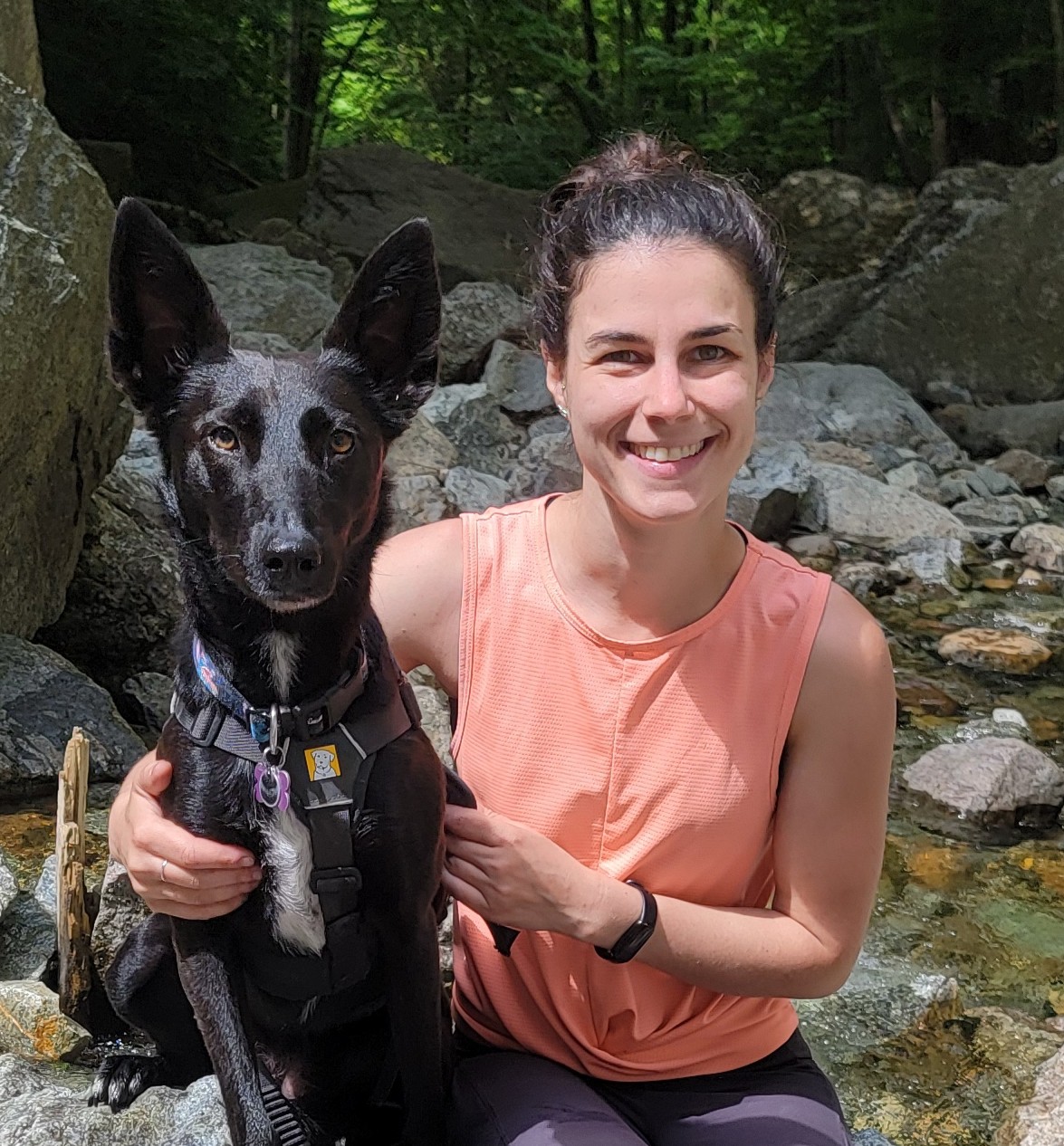author and her dog by the water