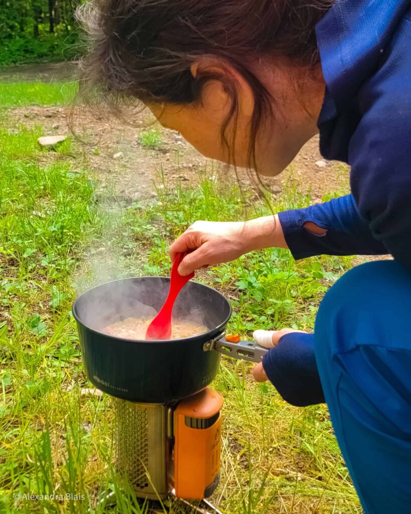 author cooking a meal with a biolite